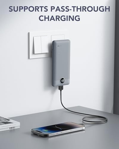 Grey portable charger with built in wall plug — photo 3
