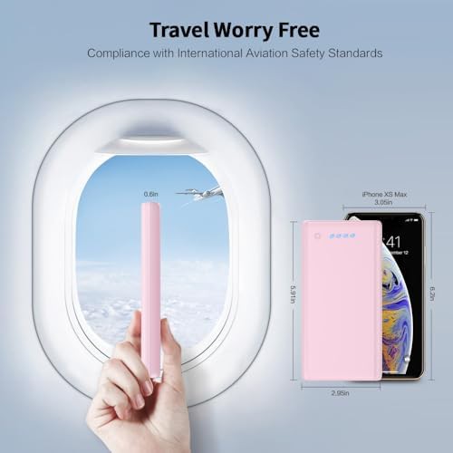 Pink portable charger with dual USB ports — photo 4